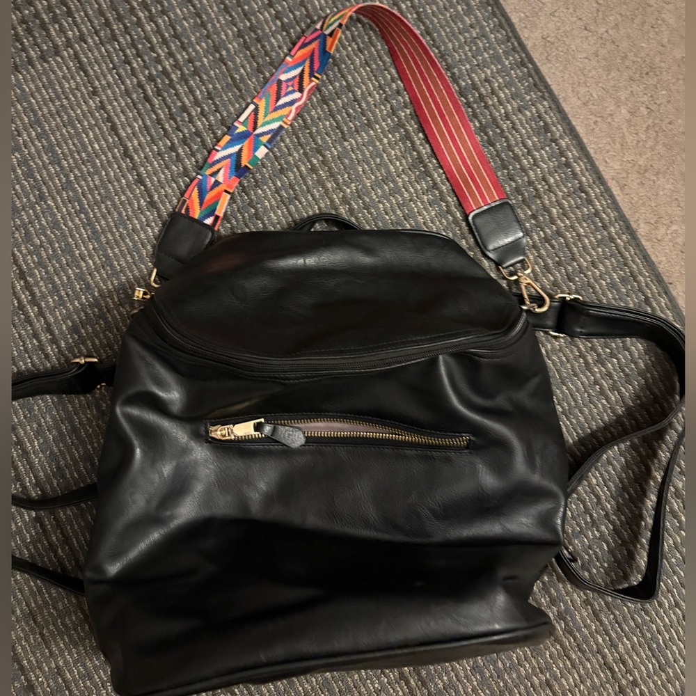 Stylish Black Backpack with Colorful Strap